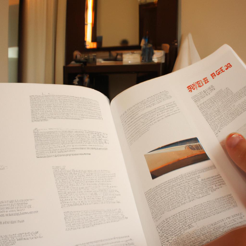 Person reading hotel review guide